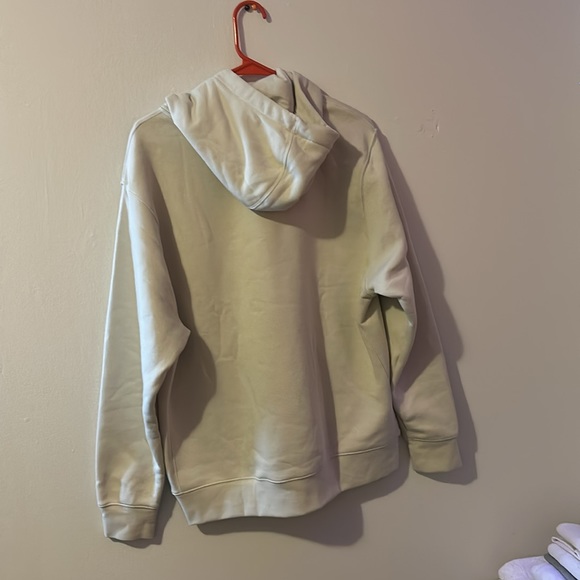 Brand New Large Nike Hoodie. (NWT)! Cream colored, with a black Nike swoosh. - Picture 7 of 8